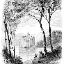 Two people are seen from behind sitting on the shores of Lake Geneva, facing Chillon Castle