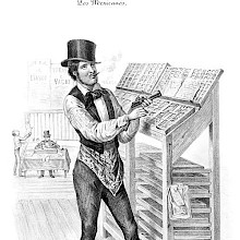 A dapper compositor in a top hat is smoking a cigar while filling in a line of type