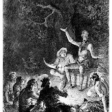 Don Quixote is sitting under a tree and makes a speech to goatherds gathered around a fire