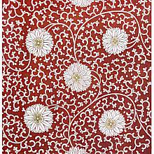 Intricate design with white flowers against a reddish brown background