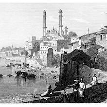 View of the Ganges with the city of Varanasi on its shore, showing domes and minarets