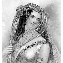 Portrait of Cleopatra wearing a headdress with hanging veils while tilting her head to the right
