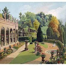 Gardens at Alton Towers with the colonnade, a walk, and the Gothic Prospect Tower in the background