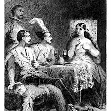 Three men and a woman are sitting at the dinner table as the woman points to herself