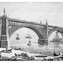 Eads Bridge and the Mississippi riverfront busy with horse-drawn carts