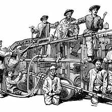 View of Ferroux's pneumatic boring machine with its operating crew of workers