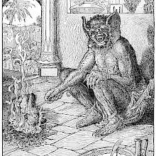 A one-eyed monster with large ears sits by a fire and holds a spit on which a man is roasting