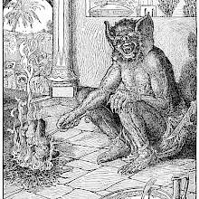 A one-eyed monster with large ears sits by a fire, holding a spit on which a man is roasting