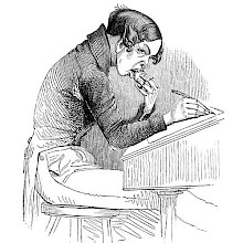 A young man in a torn jacket sits at a desk and eats an apple while writing on a piece of paper.
