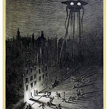 A small crowd is dances the street at night as a towering robot-like figure watches in dark