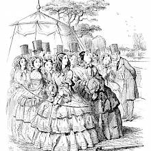 At a garden party, a young lady standing in front of other women is bending a bow