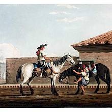 Two milk boys and horses  as they are getting ready to deliver milk carried in jars hanging from the saddles