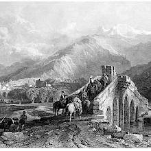 Travelers are crossing a bridge with Mount Olympus in the background