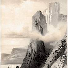 Rocky needle rising from the water south of Hornviken, North Cape, Norway