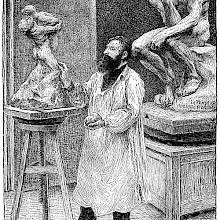 View of Auguste Rodin working in his studio on a clay version of what looks like The Abduction