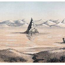 View of Pyramid Lake, Nevada, showing the pyramid and a hilly landscape in the background