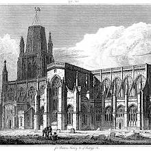 View of the south side of St Mary Redcliffe in Bristol showing the transept and churchyard.