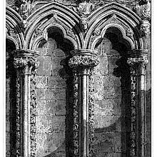 Gothic niches of the old organ screen of Salisbury Cathedral, showing ornate columns