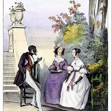 A young man is sitting in a park, conversing with a young woman and her mother