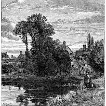 View of a large pond with a village in the background, partly hidden by a clump of trees