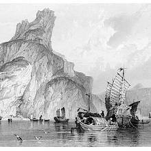 View of the Gulf of Tonkin With boats sailing around a majestic rock
