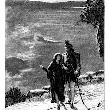 A woman and a man are walking arm in arm on a path overlooking the waters of a choppy lake