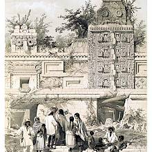 A group of people gathered in front of a Mayan building adorned with elaborate decoration