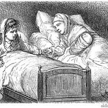 Children in bed holding hands