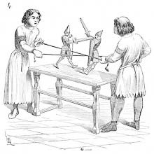 Two boys playing with puppets