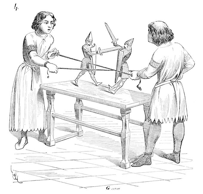 Two boys playing with puppets