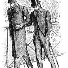 Two bearded men wearing top hats walk gloomily arm in arm on a bridge