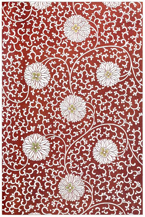 Intricate design with white flowers against a reddish brown background