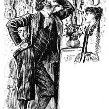A man leans on a wall where violins with scrolls shaped as women's head are hanging