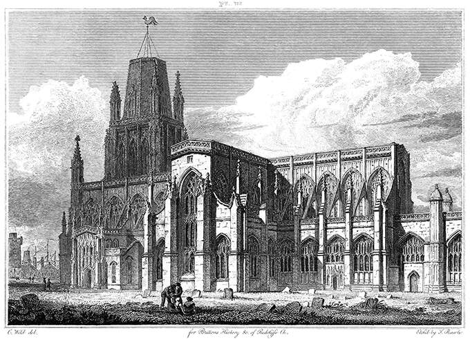 View of the south side of St Mary Redcliffe in Bristol showing the transept and churchyard.