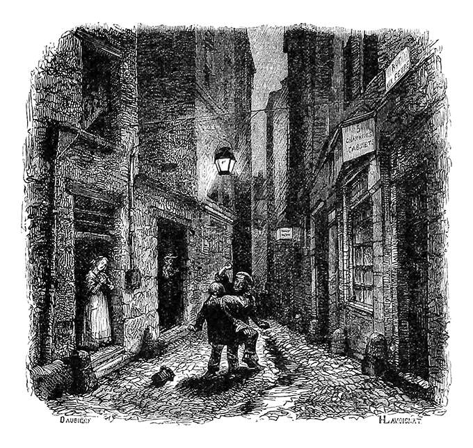 Two men are fighting in a narrow street at night