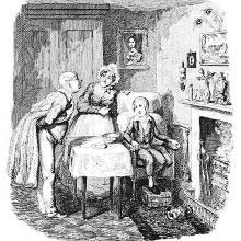 A boy is sitting by a fireplace in the presence a man and his housekeeper