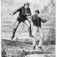 Two men are suspended in mid-air, one on his way up, the other on his way down