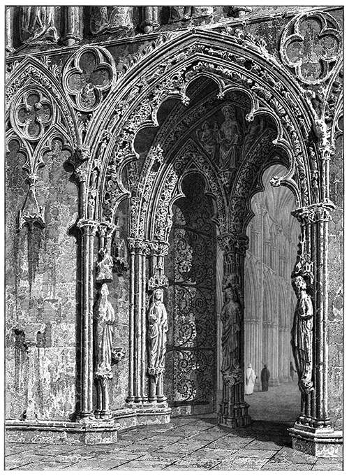 Western doorway of Lichfield Cathedral decorated with foliage and figures