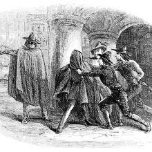 A man has a cloak flung over his head by a gang lead by a figure wearing a mask