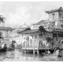 View of a opulent house built on piles on a canal near Guangzhou, China