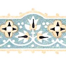 Headpiece with floral design, blueish-gray background, and subdued orange border