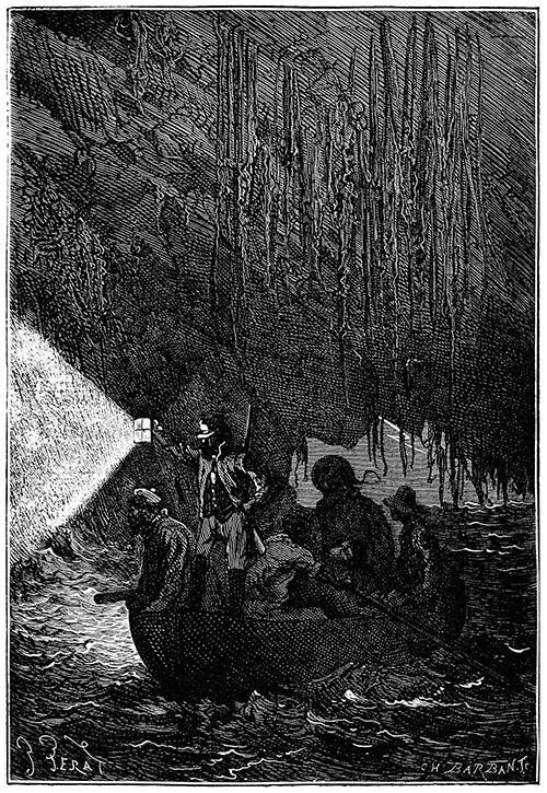 A group of men explores a sea cave in a rowboat, lighting the way with a lantern