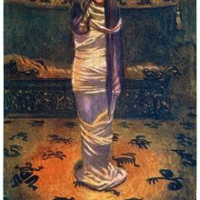 A female figure in a shroud stands in a room decorated with hieroglyphic drawings