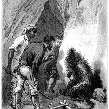 Three men are gathered around an orang-outang at the entrance of a cave