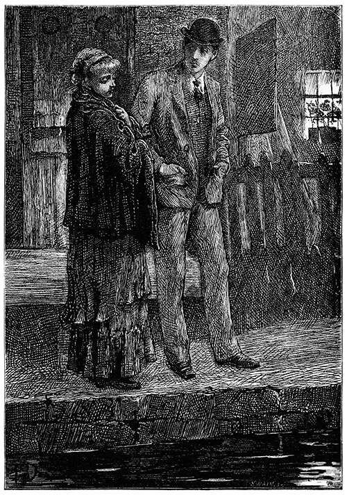 A woman and a man stand by the riverside at night, he looking at her, and she at the water