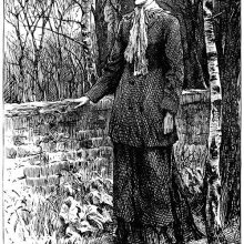A woman in a landscape filled with leafless trees lets her hand rests on a low wall