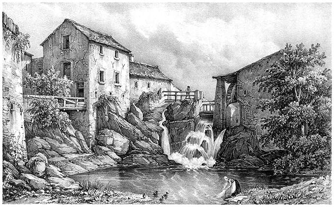 Waterfall cascading into a pond surrounded by a water mill and various buildings