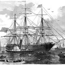 A clipper ship is about to leave the harbor, surrounded by tugs and small boats