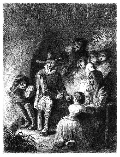 A group of people are gathered around a table near a fireplace