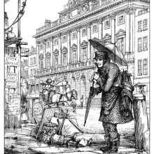 A man stands in the rain with an umbrella over his head and a bunch of them strapped on his back